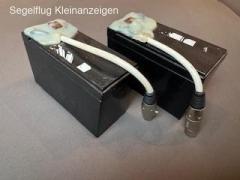 2 Batterien inkl. Ladegerät